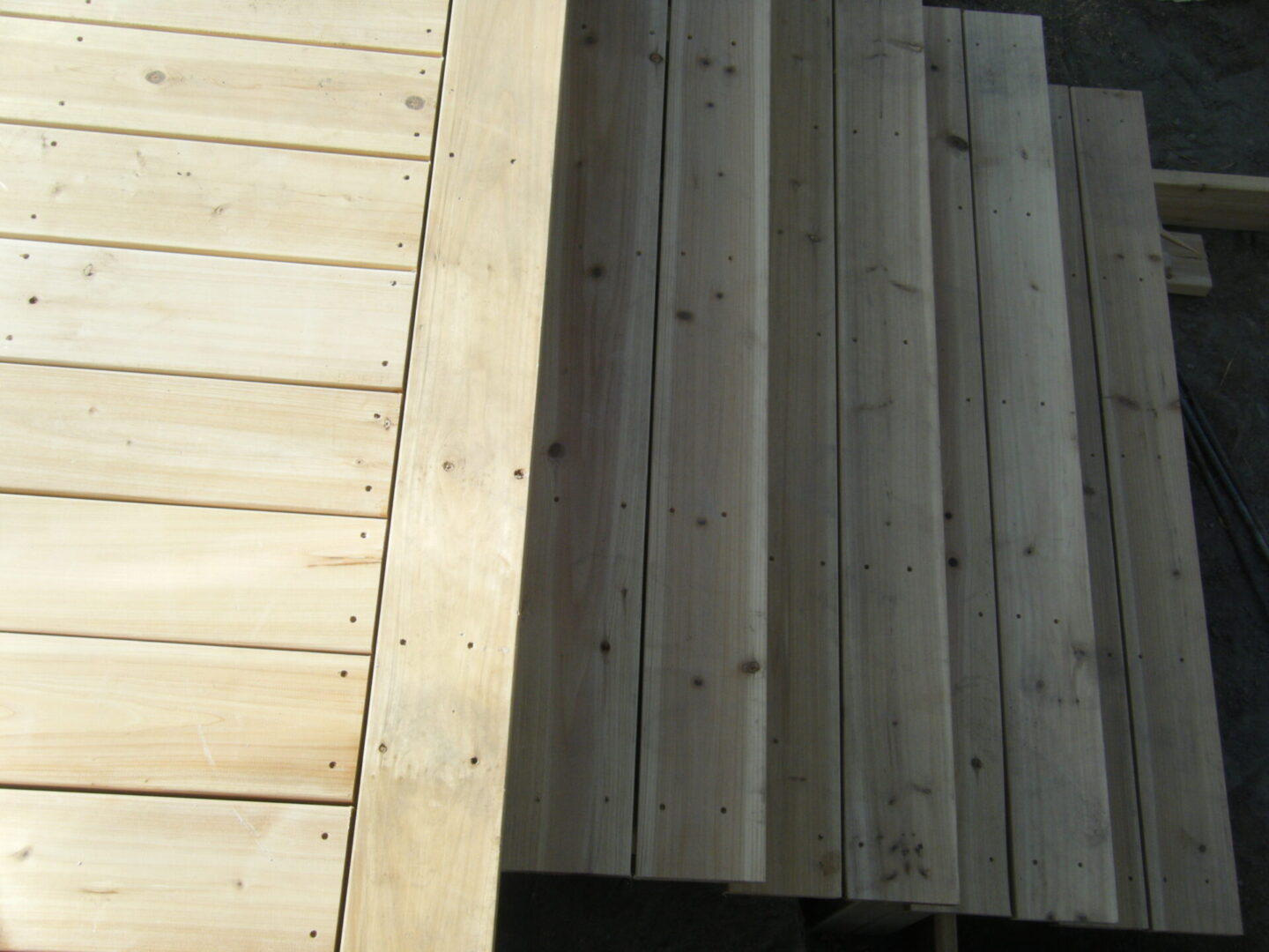 Closer view of a wooden deck with stairs