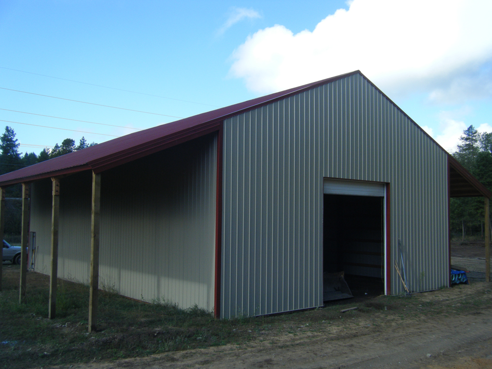 Side view of a workshop with extended roof