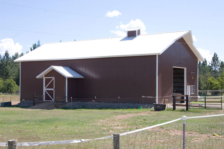Angled view of a brown barn