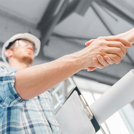 Contractor shaking hands with a client